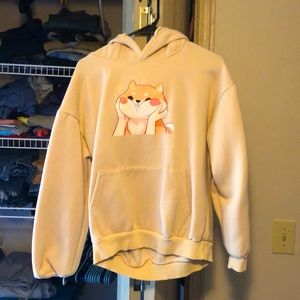 Tan hoodie with dog on front